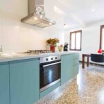 Venice Apartment with canal view Ca Grimani blue kitchen